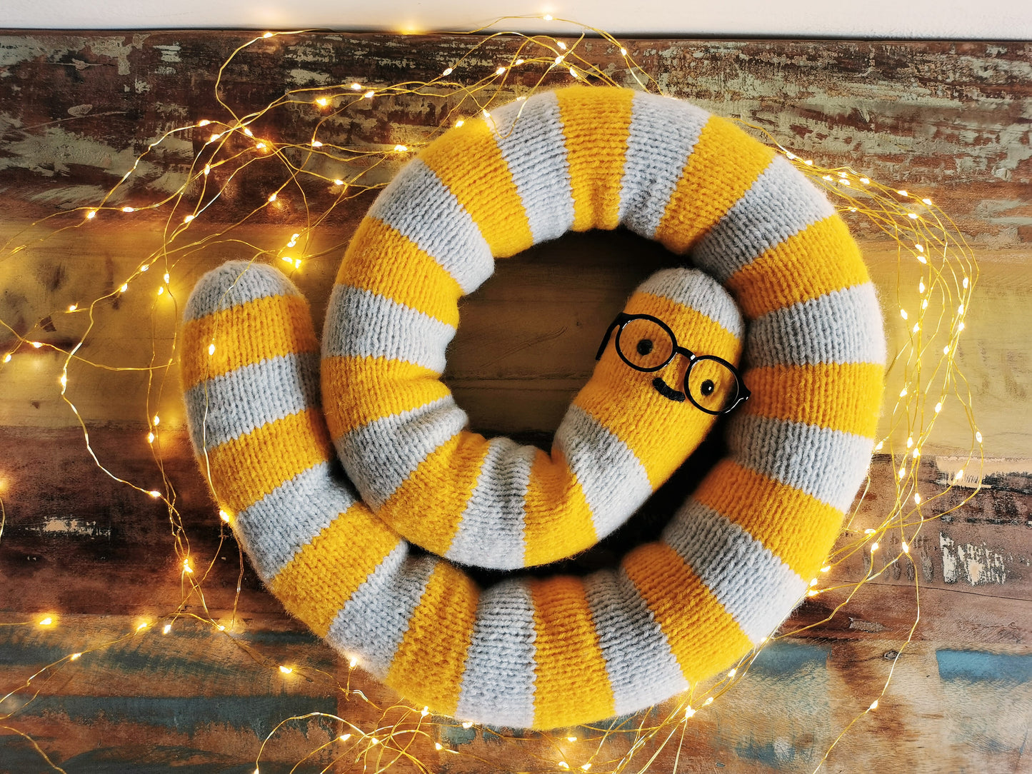 Knitted giant worm, hand knitted wool plush, fantasy creature, yellow-gray, 145cm long