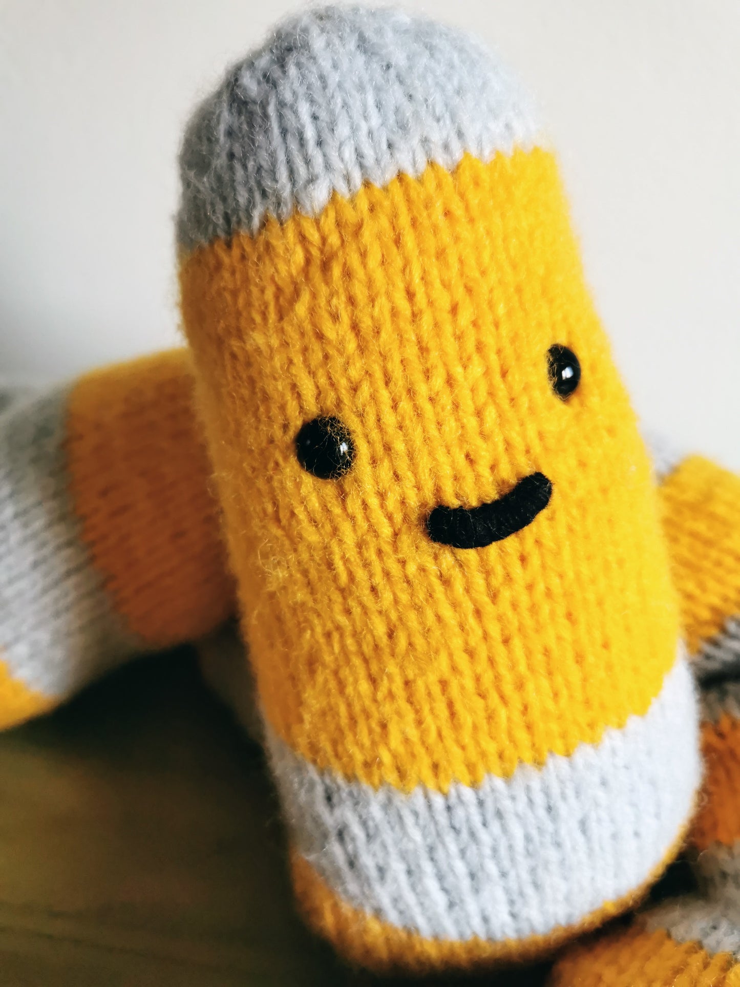 Knitted giant worm, hand knitted wool plush, fantasy creature, yellow-gray, 145cm long