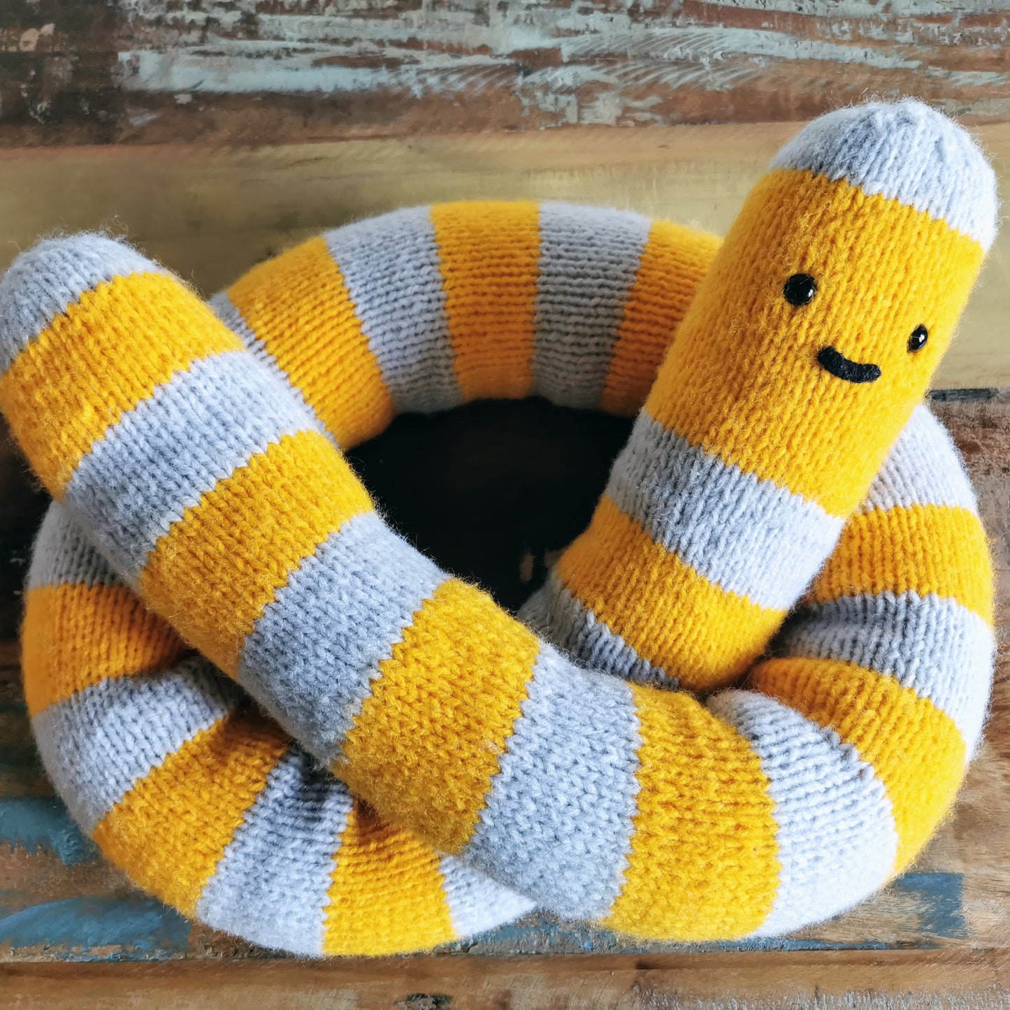 Knitted giant worm, hand knitted wool plush, fantasy creature, yellow-gray, 145cm long