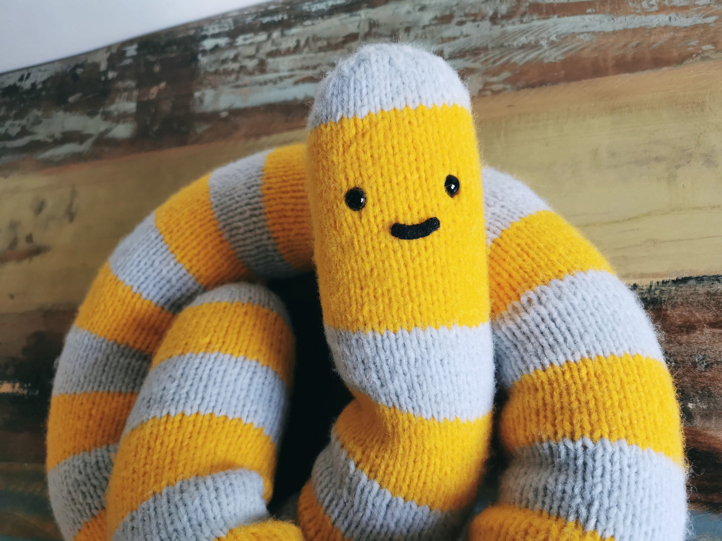 Knitted giant worm, hand knitted wool plush, fantasy creature, yellow-gray, 145cm long