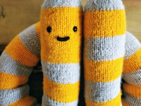 Knitted giant worm, hand knitted wool plush, fantasy creature, yellow-gray, 145cm long