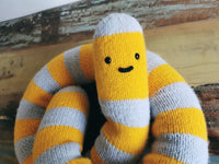 Knitted giant worm, hand knitted wool plush, fantasy creature, yellow-gray, 145cm long